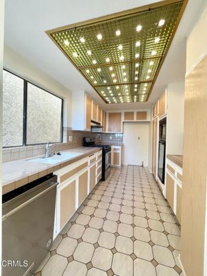 Interior, Kitchen, Recessed Lighting, Stainless Steel Appliances, Tile Countertops