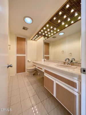 Bathroom, Dual Sink Vanities, Interior, Recessed Lighting, Tile Countertops