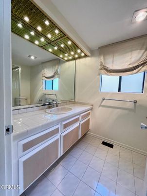 Bathroom, Dual Sink Vanities, Interior, Recessed Lighting, Tile Countertops