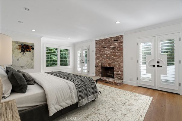 Bedroom, Fireplace, Interior, Recessed Lighting, Stone Walls, Wood Texture Flooring