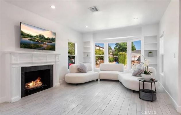 Fireplace, Interior, Living room, Recessed Lighting, Wood Texture Flooring