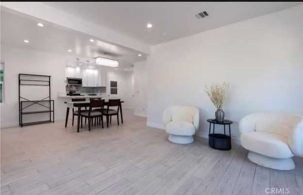 Dining room, Interior, Kitchen, Recessed Lighting, Stainless Steel Appliances, Wood Texture Flooring