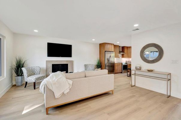 Fireplace, Interior, Kitchen, Living room, Recessed Lighting, Stainless Steel Appliances, Wood Texture Flooring