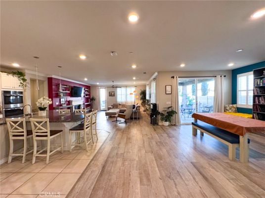 Dining room, Interior, Kitchen, Living room, Pendant Lights, Recessed Lighting, Stainless Steel Appliances, Wood Texture Flooring