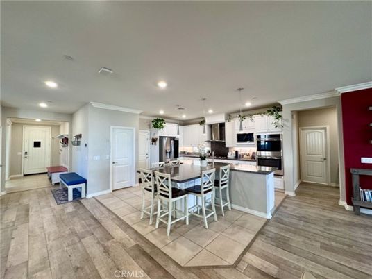 Dining room, Interior, Kitchen, Pendant Lights, Recessed Lighting, Stainless Steel Appliances, Wood Texture Flooring
