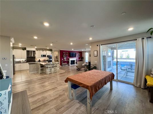 Dining room, Interior, Kitchen, Recessed Lighting, Stainless Steel Appliances, Wood Texture Flooring