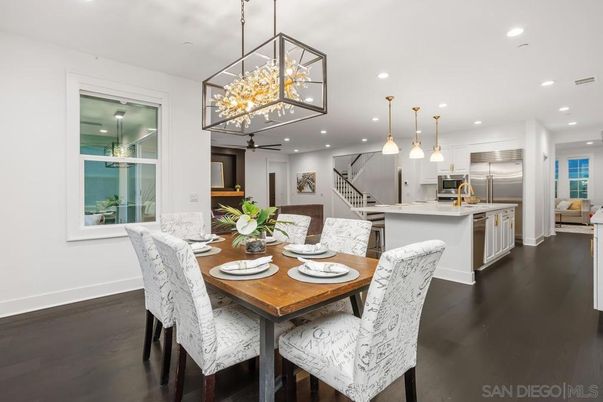 Dining room, Interior, Kitchen, Pendant Lights, Recessed Lighting, Stainless Steel Appliances, Wood Texture Flooring