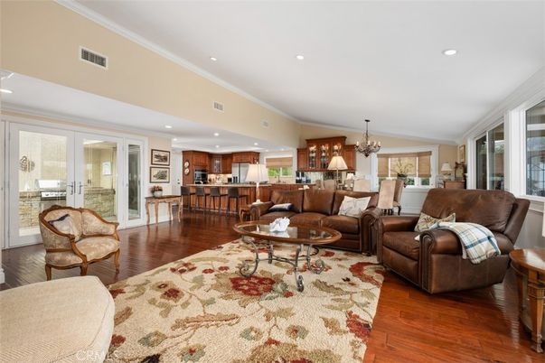 Chandelier, Dining room, Interior, Kitchen, Living room, Recessed Lighting, Wood Texture Flooring