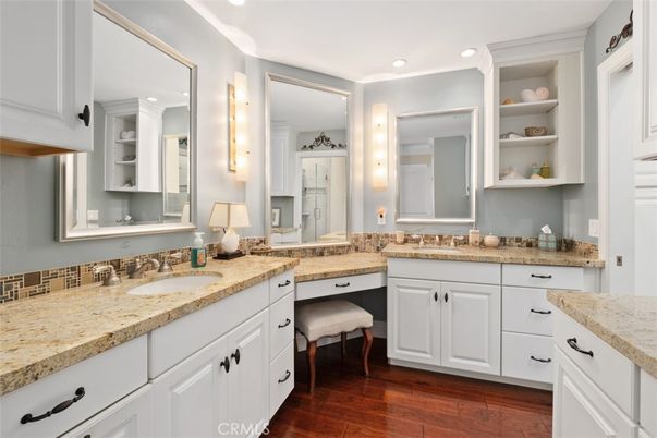 Bathroom, Dual Sink Vanities, Interior, Recessed Lighting, Wood Texture Flooring