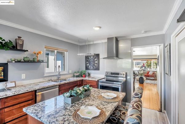 Dining room, Interior, Kitchen, Recessed Lighting, Stainless Steel Appliances, Wood Texture Flooring