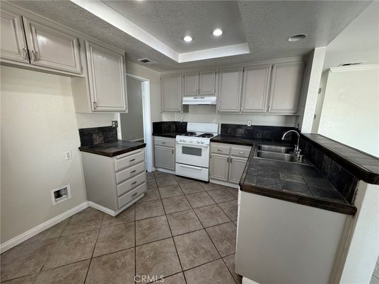 Interior, Kitchen, Recessed Lighting, Tile Countertops