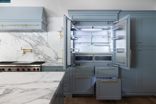 Interior, Kitchen, Marble Walls, Stainless Steel Appliances, Wood Texture Flooring