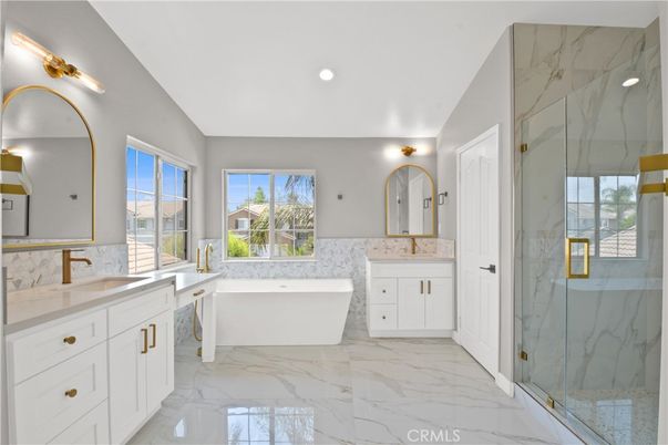 Bathroom, Dual Sink Vanities, Free Standing Baths, Glass Shower, Interior, Marble, Marble Walls, Recessed Lighting
