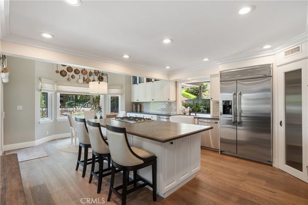 Dining room, Interior, Kitchen, Recessed Lighting, Stainless Steel Appliances, Wood Texture Flooring