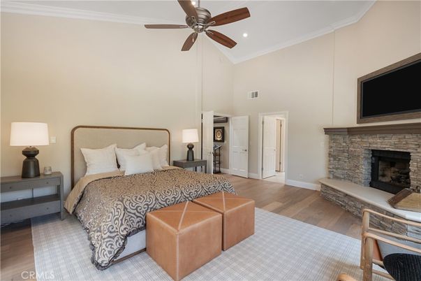 Bedroom, Fireplace, Interior, Recessed Lighting, Wood Texture Flooring