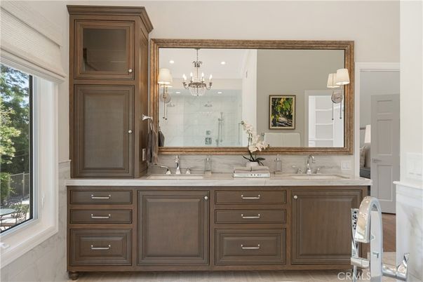 Bathroom, Chandelier, Dual Sink Vanities, Interior, Marble Walls, Recessed Lighting