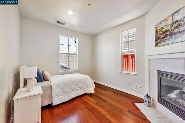 Bedroom, Fireplace, Interior, Recessed Lighting, Wood Texture Flooring
