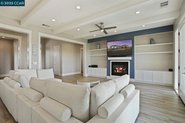 Fireplace, Interior, Living room, Recessed Lighting, Wood Texture Flooring