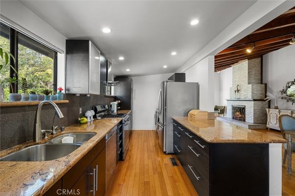 Fireplace, Interior, Kitchen, Recessed Lighting, Wood Texture Flooring