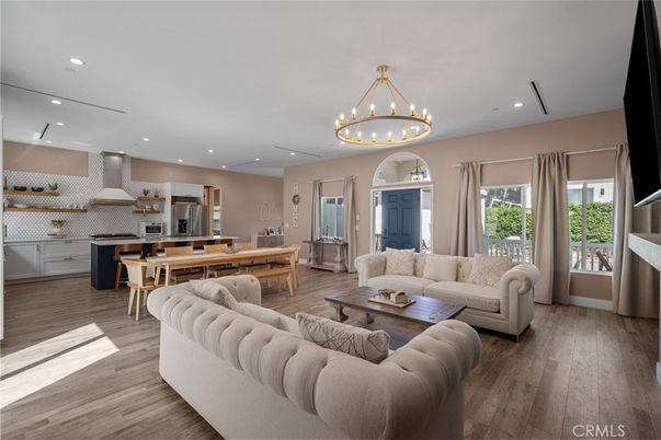 Chandelier, Interior, Kitchen, Living room, Recessed Lighting, Stainless Steel Appliances, Wood Texture Flooring