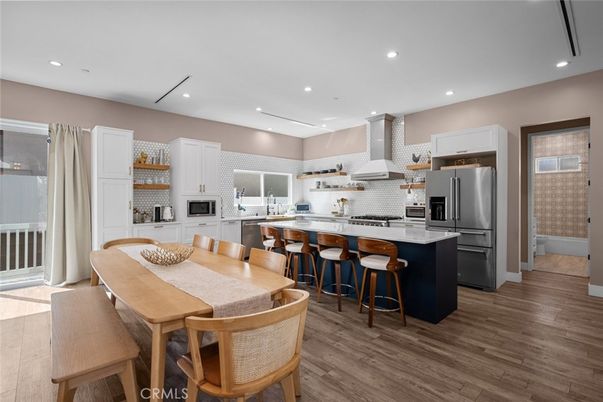 Dining room, Interior, Kitchen, Recessed Lighting, Stainless Steel Appliances, Wood Texture Flooring