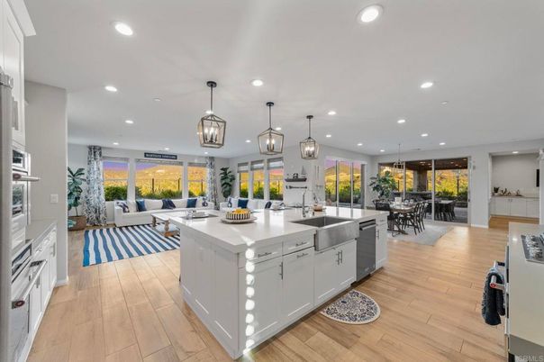 Dining room, Interior, Kitchen, Living room, Pendant Lights, Recessed Lighting, Stainless Steel Appliances, Wood Texture Flooring