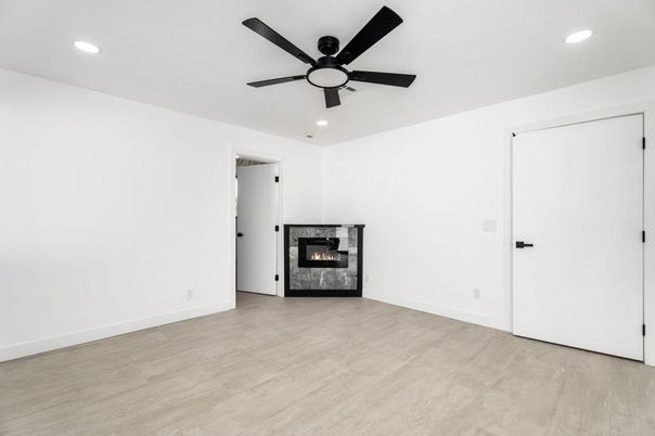 Empty room, Fireplace, Interior, Recessed Lighting, Wood Texture Flooring
