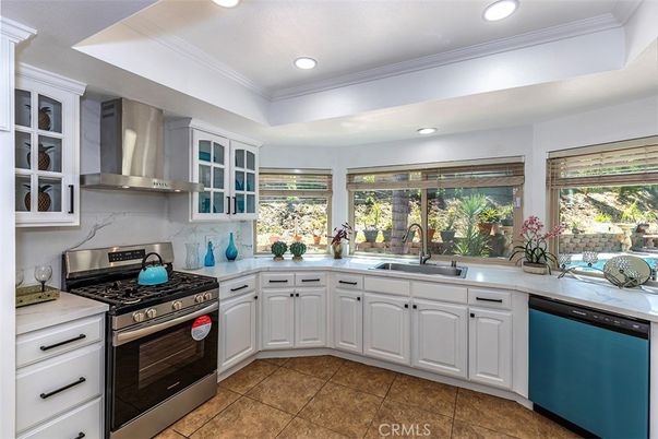Interior, Kitchen, Marble Walls, Recessed Lighting, Stainless Steel Appliances