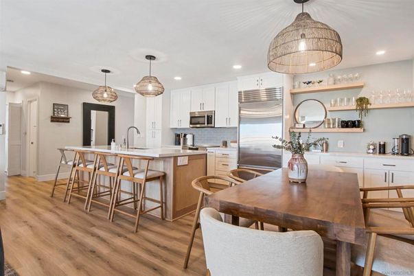 Dining room, Interior, Kitchen, Pendant Lights, Recessed Lighting, Stainless Steel Appliances, Wood Texture Flooring