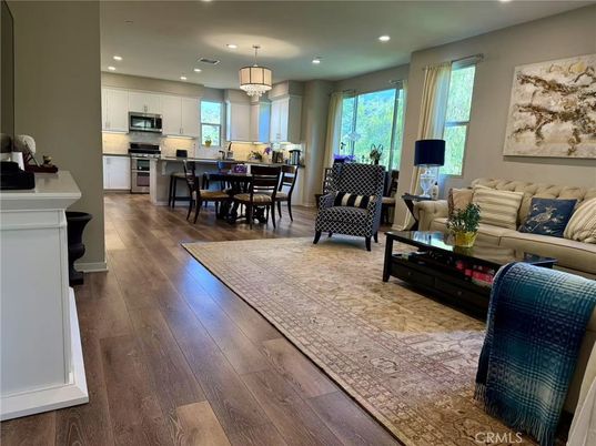 Chandelier, Dining room, Interior, Kitchen, Living room, Recessed Lighting, Stainless Steel Appliances, Wood Texture Flooring