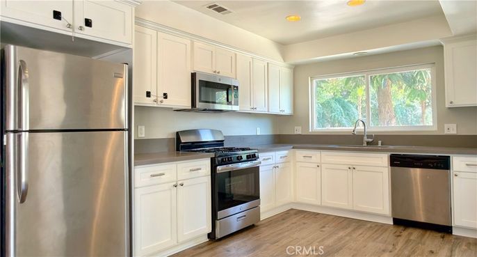Interior, Kitchen, Recessed Lighting, Stainless Steel Appliances, Wood Texture Flooring