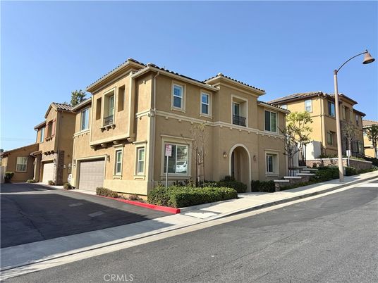 Attached, Exterior, Facade, Mediterranean