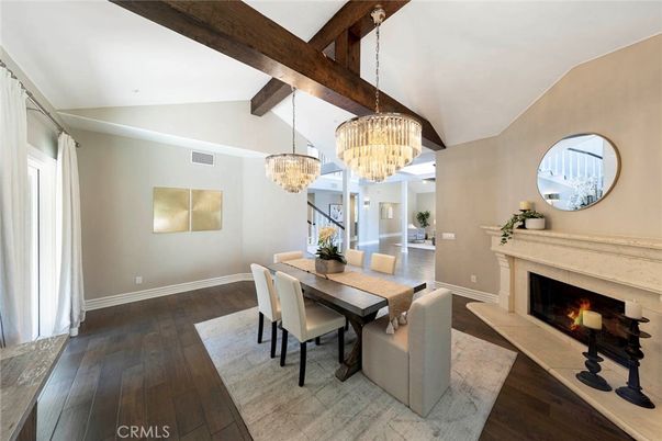 Chandelier, Dining room, Fireplace, Interior, Wooden Beams, Wood Texture Flooring