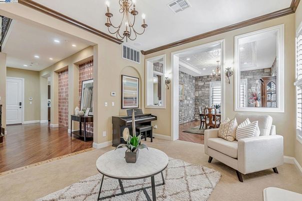 Chandelier, Interior, Living room, Piano, Recessed Lighting, Stone Walls, Wood Texture Flooring