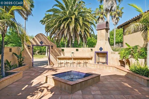 Exterior, Fireplace, Pool