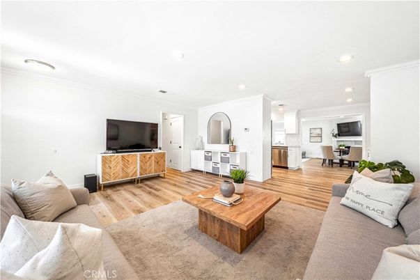 Dining room, Interior, Kitchen, Living room, Recessed Lighting, Stainless Steel Appliances, Wood Texture Flooring