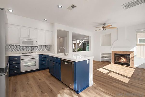 Fireplace, Interior, Kitchen, Recessed Lighting, Wood Texture Flooring
