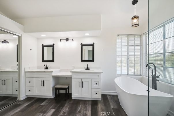 Bathroom, Dual Sink Vanities, Free Standing Baths, Interior, Pendant Lights, Recessed Lighting, Wood Texture Flooring