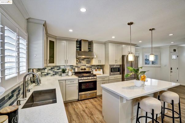 Interior, Kitchen, Pendant Lights, Recessed Lighting, Stainless Steel Appliances, Wood Texture Flooring