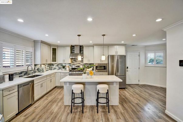Interior, Kitchen, Pendant Lights, Recessed Lighting, Stainless Steel Appliances, Wood Texture Flooring