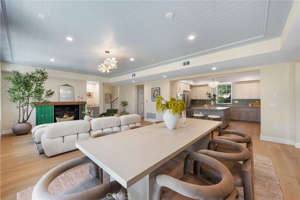 Chandelier, Dining room, Fireplace, Interior, Kitchen, Living room, Pendant Lights, Recessed Lighting, Wood Texture Flooring