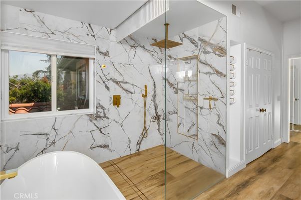 Bathroom, Free Standing Baths, Glass Shower, Interior, Marble Walls, Wood Texture Flooring