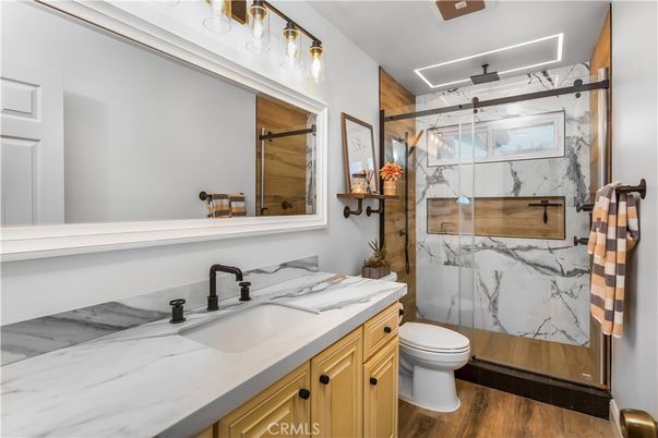 Bathroom, Glass Shower, Interior, Marble Walls, Wood Texture Flooring