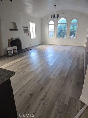 Empty room, Fireplace, Interior, Pendant Lights, Wood Texture Flooring