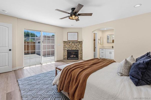 Bedroom, Fireplace, Interior, Recessed Lighting, Wood Texture Flooring
