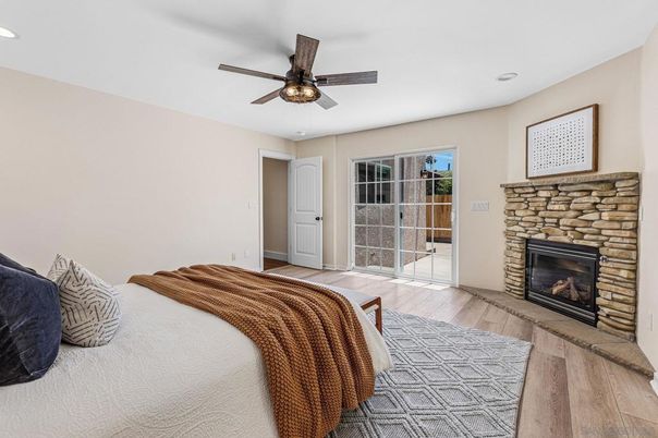 Bedroom, Fireplace, Interior, Recessed Lighting, Wood Texture Flooring