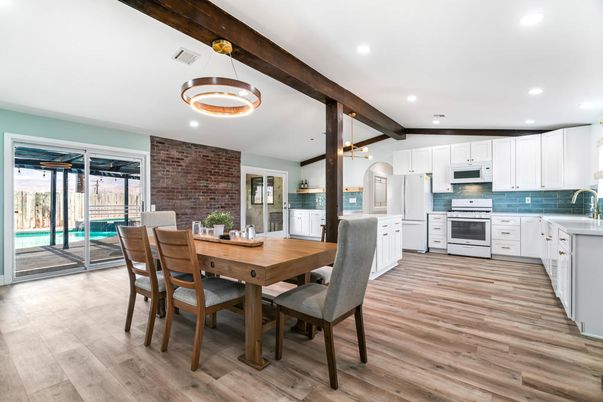 Dining room, Interior, Kitchen, Pendant Lights, Recessed Lighting, Stainless Steel Appliances, Stone Walls, Wood Texture Flooring
