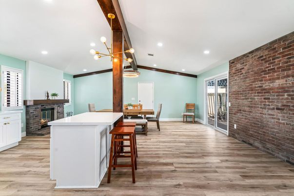 Dining room, Fireplace, Interior, Pendant Lights, Recessed Lighting, Stone Walls, Wood Texture Flooring