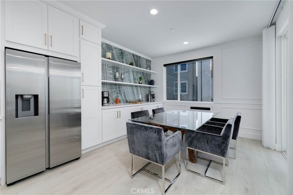 Dining room, Interior, Kitchen, Recessed Lighting, Stainless Steel Appliances, Wood Texture Flooring