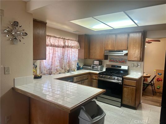 Interior, Kitchen, Tile Countertops, Wood Texture Flooring